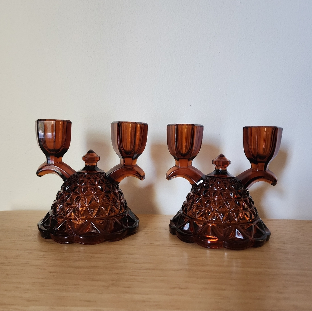 Vintage pair of double candlestick holders, dark amber glass